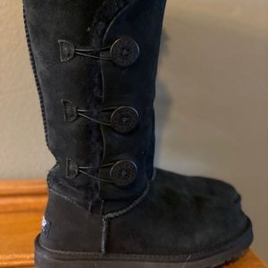 UGG boots with black buttons